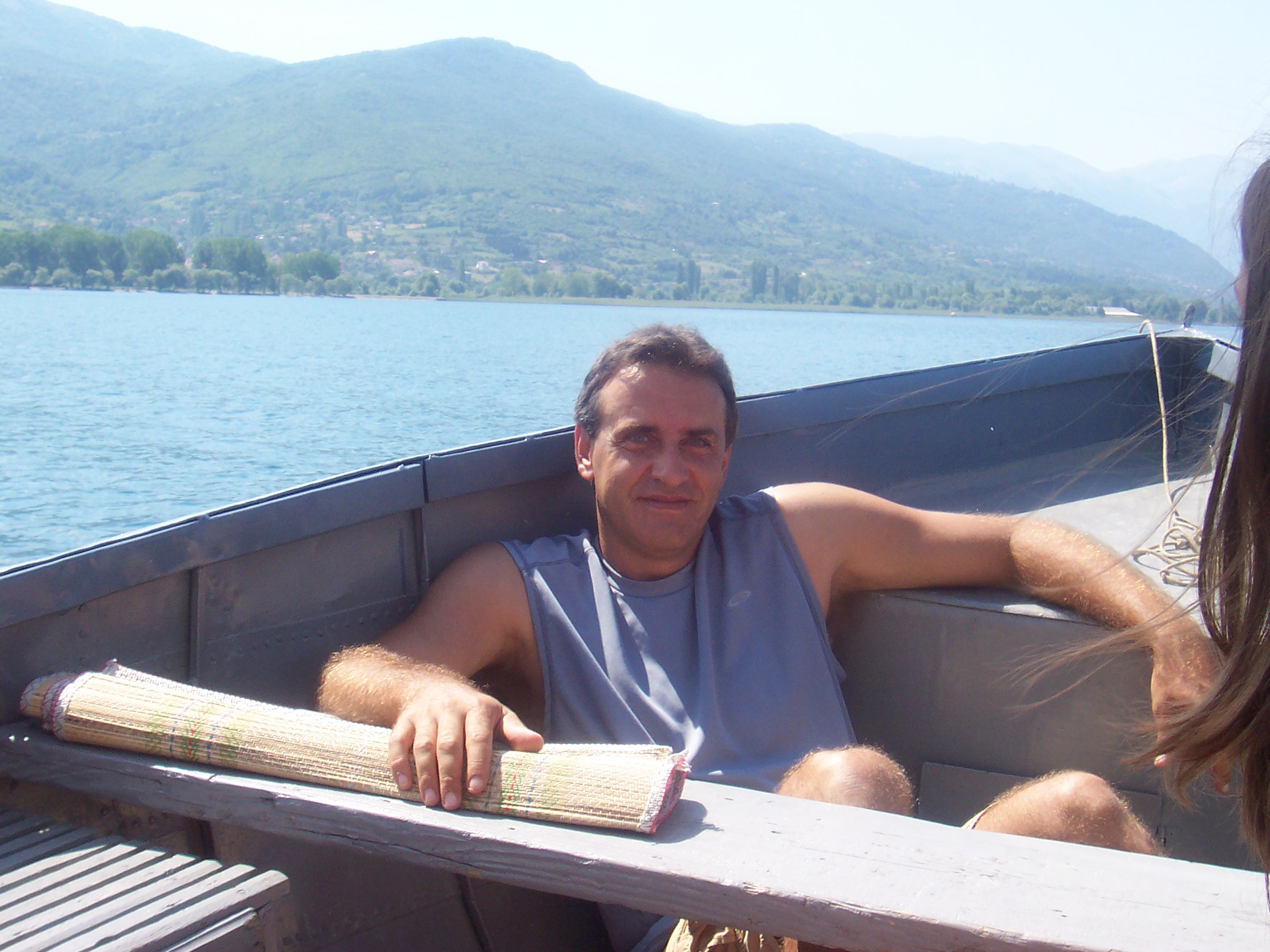 My husband in a boat (Ohrid, Macedonia, 2007)